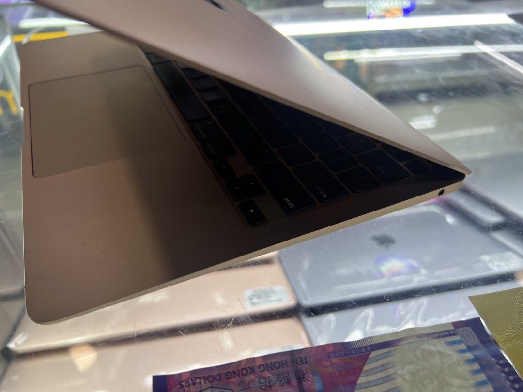 Apple MacBook Air (Category: Laptops & Notebooks) located in Manila. Submitted by vaniextura (Listing ID 1435991173, Image 3). Description: - Gold Apple MacBook Air -chip apple M1 Memory 8g -storage 512ssd -gold - Full keyboard and trackpad - Stunning forest wallpaper - Apple logo present No issues or dents No history repair All good working Very smooth performance 09482707745 09910253518 Pm for sure buyer .