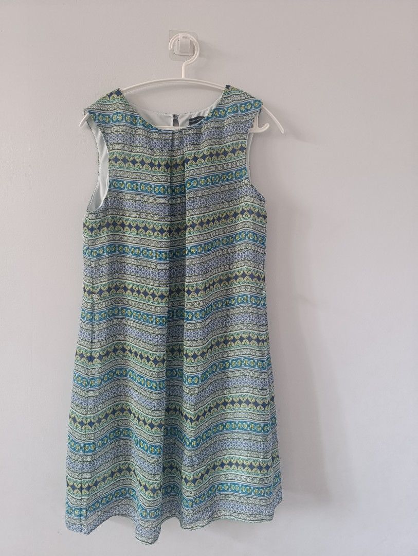 Atmosphere Sleeveless Dress (Category: Dresses) located in Manila. Submitted by stuffsbybrix (Listing ID 1434025031, Image 1). Description: - Sleeveless dress - Features a blue, green, and white pattern - Round neckline - Straight silhouette - Size 12 - Made of lightweight fabric - Perfect for warm weather - Simple and elegant design like new, missing belt Large on tag but best fit to M. Can fit small to large rfs: decluttering color may vary due