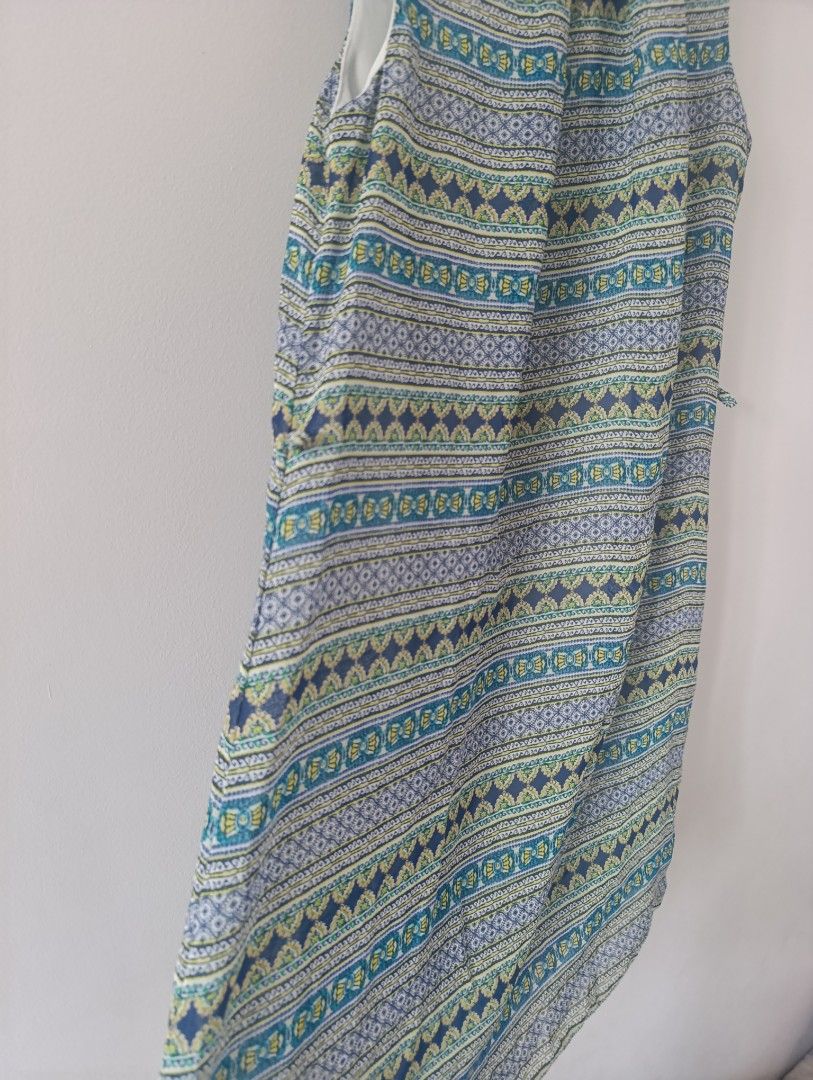 Atmosphere Sleeveless Dress (Category: Dresses) located in Manila. Submitted by stuffsbybrix (Listing ID 1434025031, Image 2). Description: - Sleeveless dress - Features a blue, green, and white pattern - Round neckline - Straight silhouette - Size 12 - Made of lightweight fabric - Perfect for warm weather - Simple and elegant design like new, missing belt Large on tag but best fit to M. Can fit small to large rfs: decluttering color may vary due