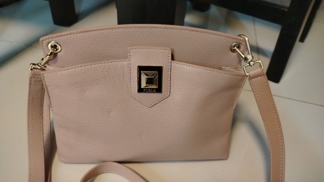authentic furla (Category: Luxury Bags & Wallets) located in Dasmarinas. Submitted by sherylrep18568 (Listing ID 1435942700, Image 2). Description: excellent condition medium size malinis at mabango.