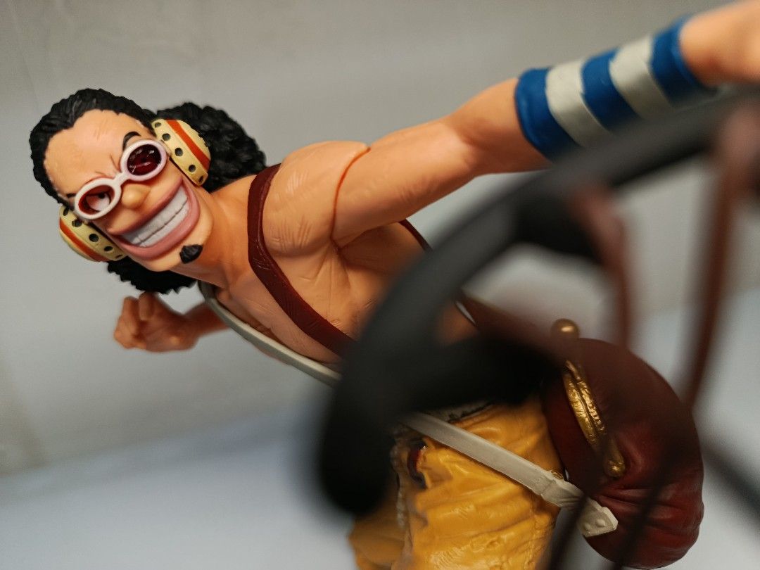 Banpresto One Piece King of Artist Usopp (Loose) (Category: Toys & Games) located in Davao. Submitted by joieful_collectibles (Listing ID 1436082072, Image 1). Description: Banpresto One Piece King of Artist Usopp figure. (Loose) - Usopp figure from One Piece - Detailed sculpting and vibrant colors - Dynamic pose with slingshot - Includes signature goggles, afro hairstyle, and outfit - This PVC figure stands approximately 14 cm (5.46 inches) tall