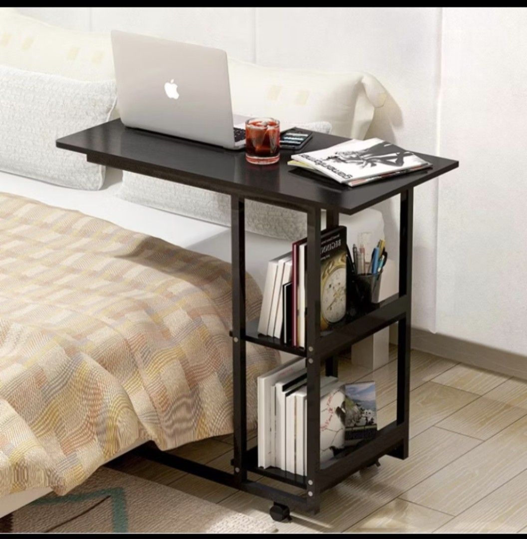 Bedside Table Side Table (Category: Other Home Furniture) located in Kuala Lumpur. Submitted by aily17 (Listing ID 1435976508, Image 2). Description: Details and dimension in 5th picture. I bought this for about RM55. One of the back wheel is broken, doesn't stay up properly. The wheels can still be used, just that the table will wobble. If you set the table to be stationary (not moving), you can adjust the broken wheel back to its place and it w
