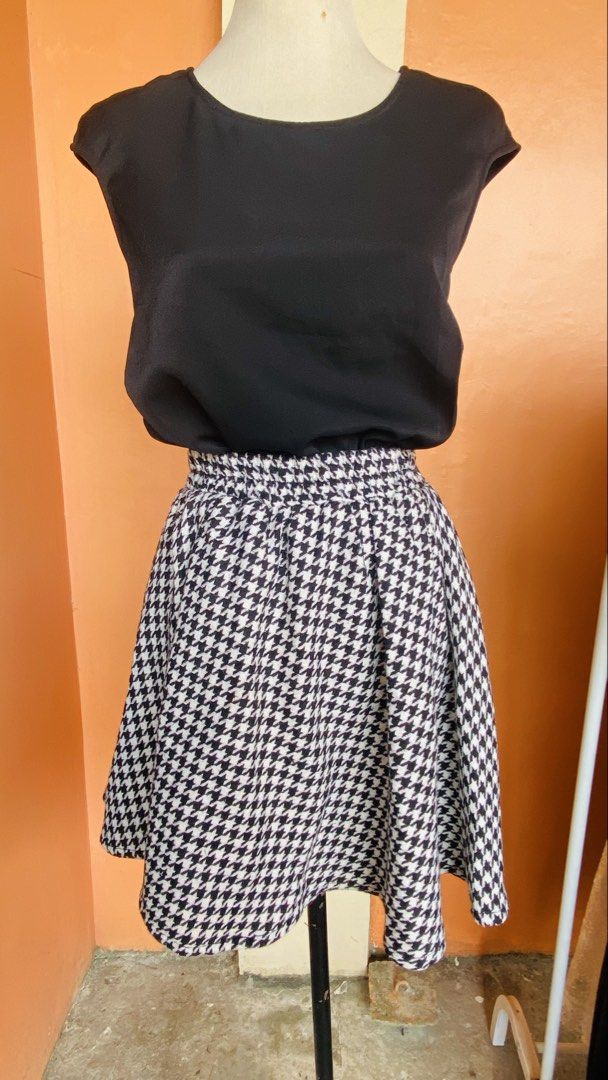 Black Top and Houndstooth Skirt Set (Category: Sets or Coordinates) located in Cavite. Submitted by yapee. (Listing ID 1435942110, Image 3). Description: - Black top with round neckline and cap sleeves. - Houndstooth flared skirt (black and white). - Perfect for casual or semi-formal wear. - Complete set..