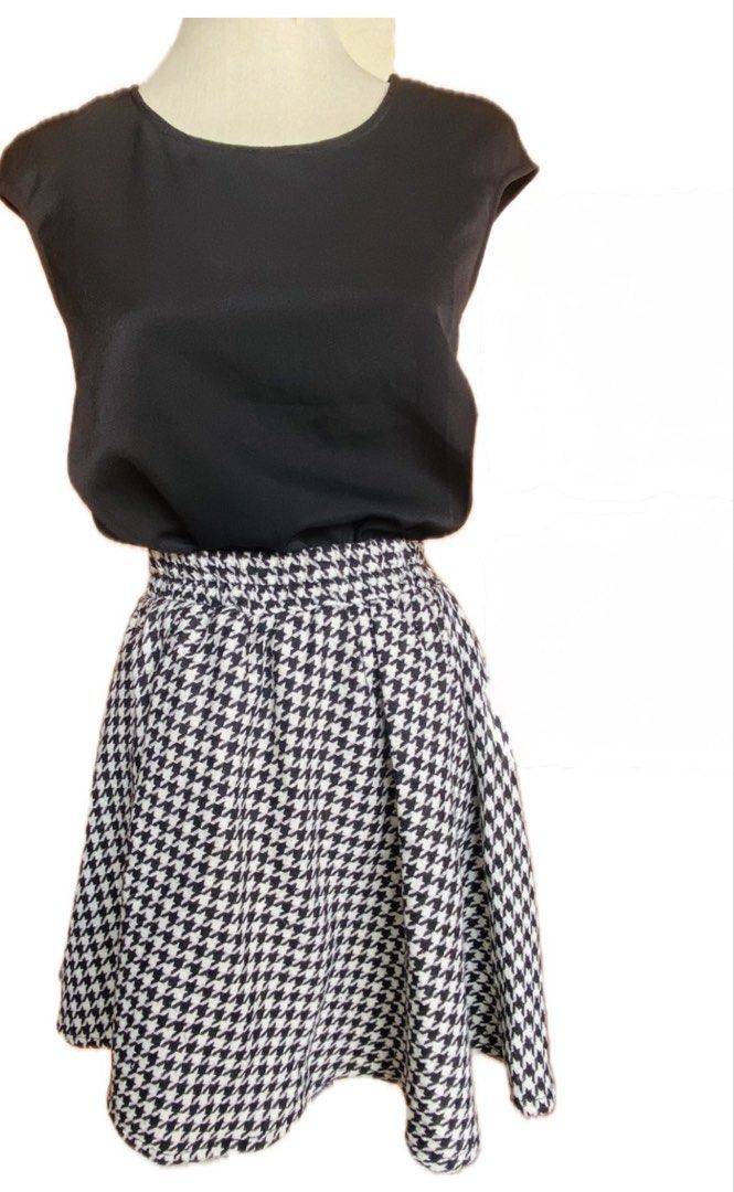 Black Top and Houndstooth Skirt Set (Category: Sets or Coordinates) located in Cavite. Submitted by yapee. (Listing ID 1435942110, Image 2). Description: - Black top with round neckline and cap sleeves. - Houndstooth flared skirt (black and white). - Perfect for casual or semi-formal wear. - Complete set..