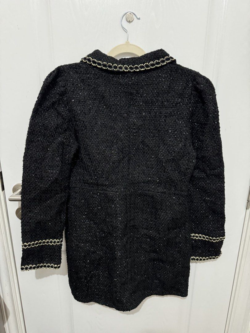 Black Tweed Coat with Gold Trim (Category: Coats, Jackets and Outerwear) located in Quezon City. Submitted by jdmc16 (Listing ID 1435968216, Image 2). Description: - Black tweed coat - Gold trim detailing - Classic collar - Double-breasted button closure - Long sleeves - Tailored fit - Textured fabric.