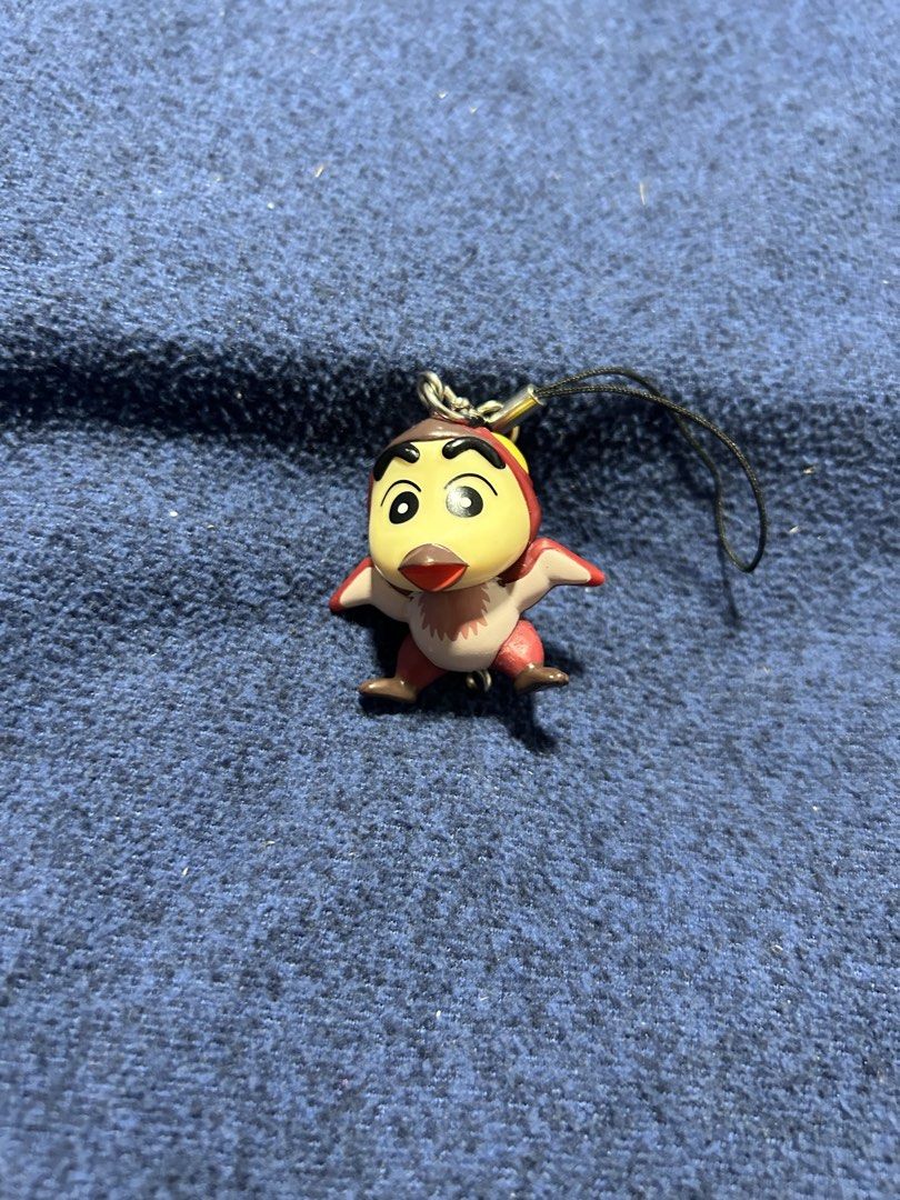 A1 Crayon Shin-chan Pteranodon mascot charm (Category: Character Goods) located in Angeles City. Submitted by zyeplustradings (Listing ID 1436095135, Image 1). Description: Crayon Shin-chan Pteranodon mascot specifically a “connectable” (tsunagaru) strap figure. This particular version features the character Shin-chan dressed in a Pteranodon dinosaur costume. .