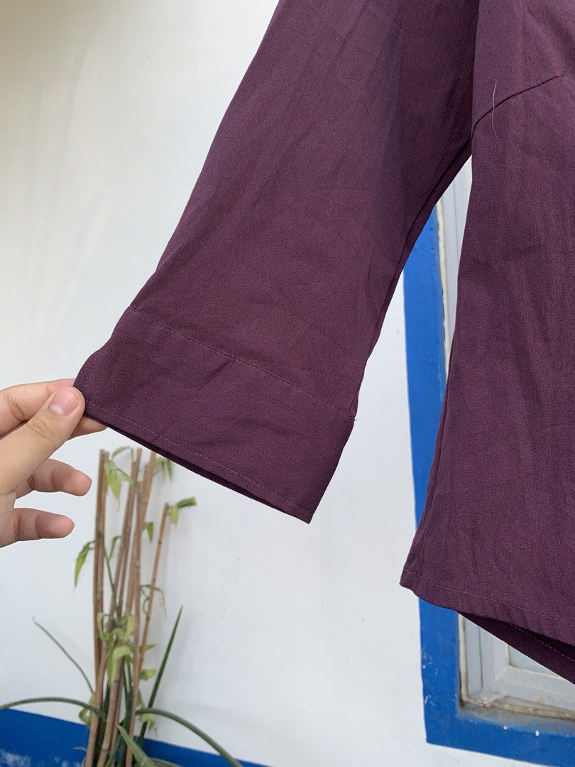 Burgundy Button-Down Blouse Size 12 (Category: Blouses) located in Cavite. Submitted by jetsyfinds (Listing ID 1436057980, Image 2). Description: - Burgundy button-down blouse - Size: 12 - Features: Collared neckline, three-quarter sleeves, button-up front - Solid color, smooth fabric - Versatile: Suitable for casual and semi-formal occasions.