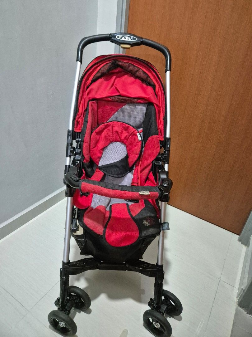Capella Stroller - Red (Category: Strollers) located in Singapore. Submitted by joeyylze (Listing ID 1435953839, Image 1). Description: - Compact and lightweight - Vibrant red and black design - Easy to fold and store - Suitable for everyday use .