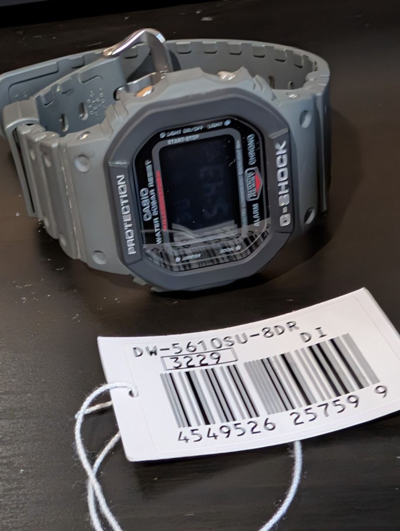 Casio G-Shock DW-5610SU-8DR Watch (Category: Men's Watches) located in Mandaluyong City. Submitted by hasegawa14 (Listing ID 1435988750, Image 3). Description: - Casio G-Shock DW-5610SU-8DR - Gray resin band and case - Digital display (time, date, day) - Water resistant to 200 meters - Shock resistant - Includes original box, manual, and tag.