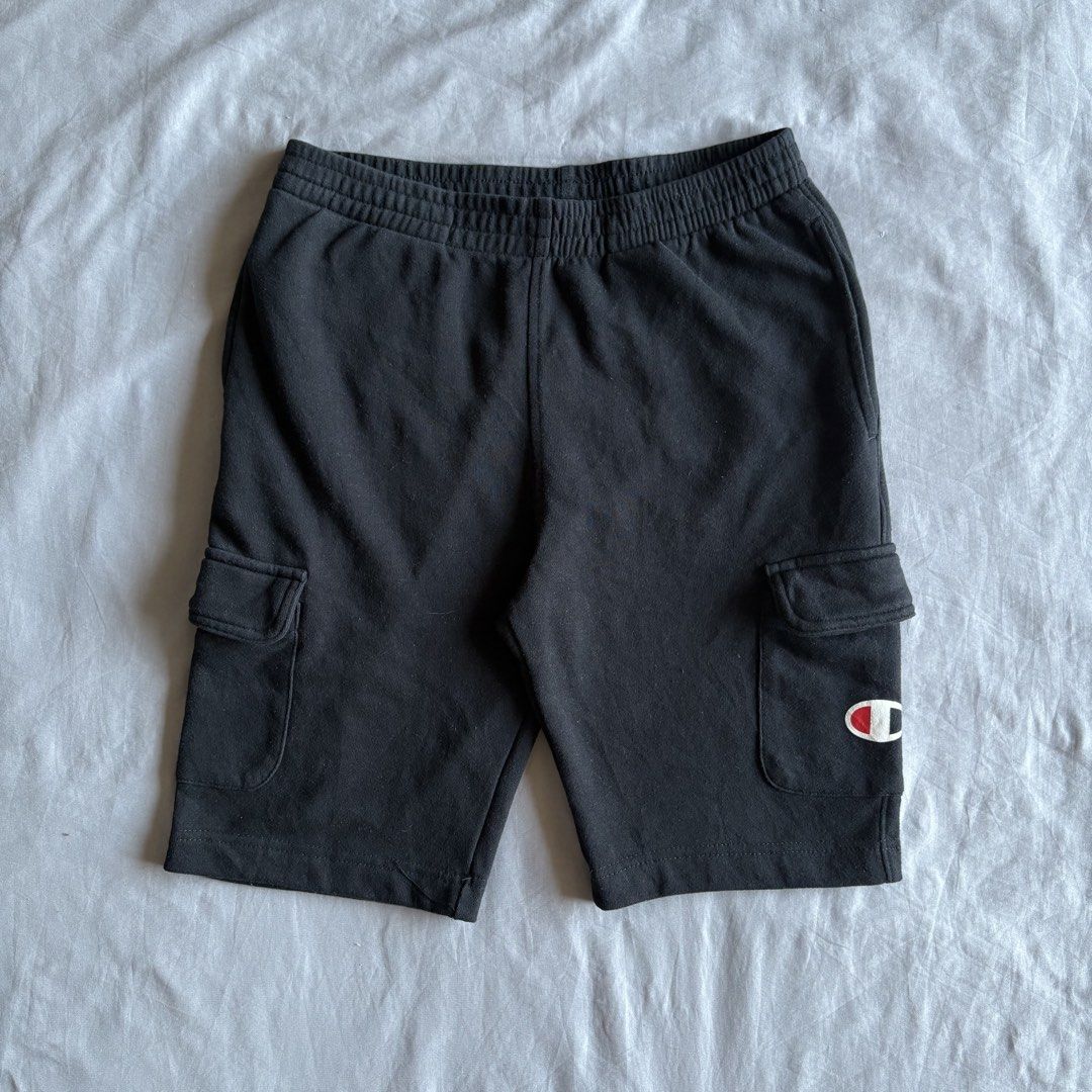 Champion Cargo Shorts - Black - Size L (Category: Shorts) located in Rizal. Submitted by thriftdrip.402 (Listing ID 1436028197, Image 1). Description: - Champion cargo shorts - Color: Black - Size: L - Features: Cargo pockets, elastic waistband, Champion logo - Material: Cotton/Polyester blend - Made in China.