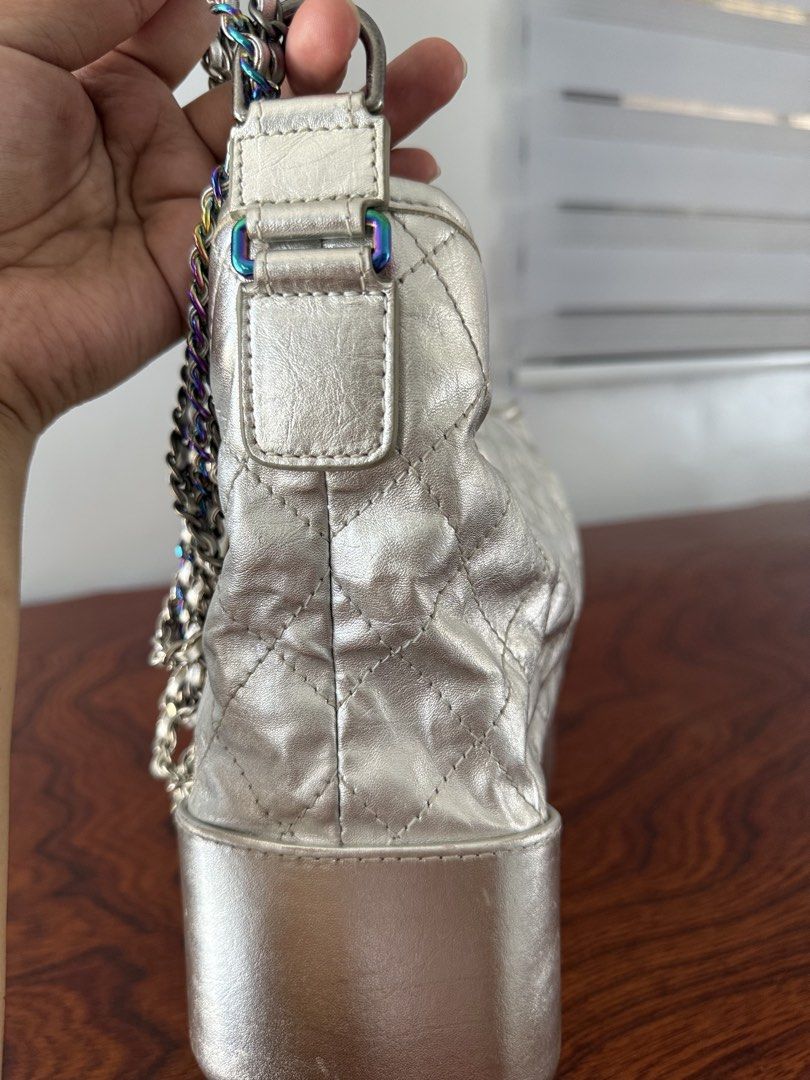 Chanel Gabrielle Hobo Bag (Category: Luxury Bags & Wallets) located in Manila. Submitted by epicmountain-430b (Listing ID 1436016627, Image 3). Description: Chanel Gabrielle Hobo Bag in silver quilted distressed calfskin with mixed rainbow hardware..