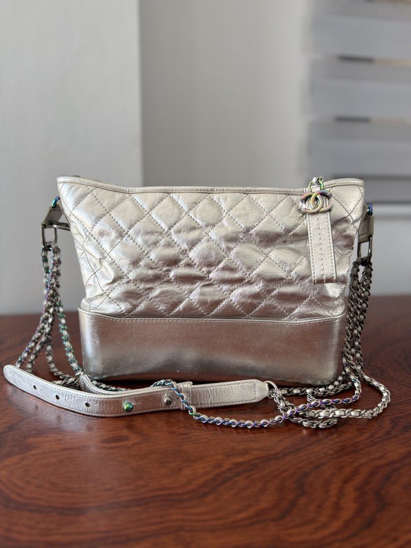 Chanel Gabrielle Hobo Bag (Category: Luxury Bags & Wallets) located in Manila. Submitted by epicmountain-430b (Listing ID 1436016627, Image 1). Description: Chanel Gabrielle Hobo Bag in silver quilted distressed calfskin with mixed rainbow hardware..