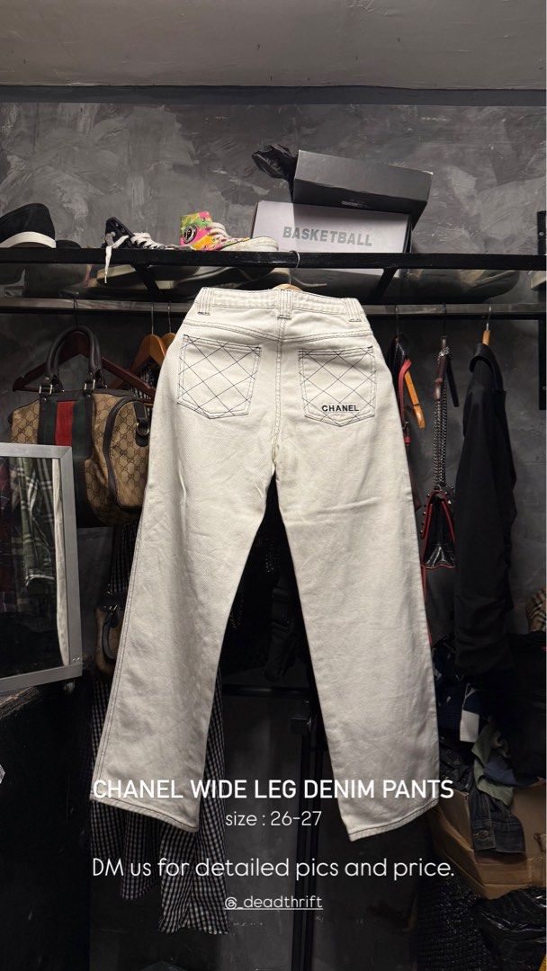 Chanel Wide Leg Denim Pants (Category: Jeans) located in Legazpi City. Submitted by deadthrift (Listing ID 1436043557, Image 3). Description: - Chanel white denim pants - Black stitching detail - Chanel logo on back pocket and button - Size: 26-27 (Tag size 36).
