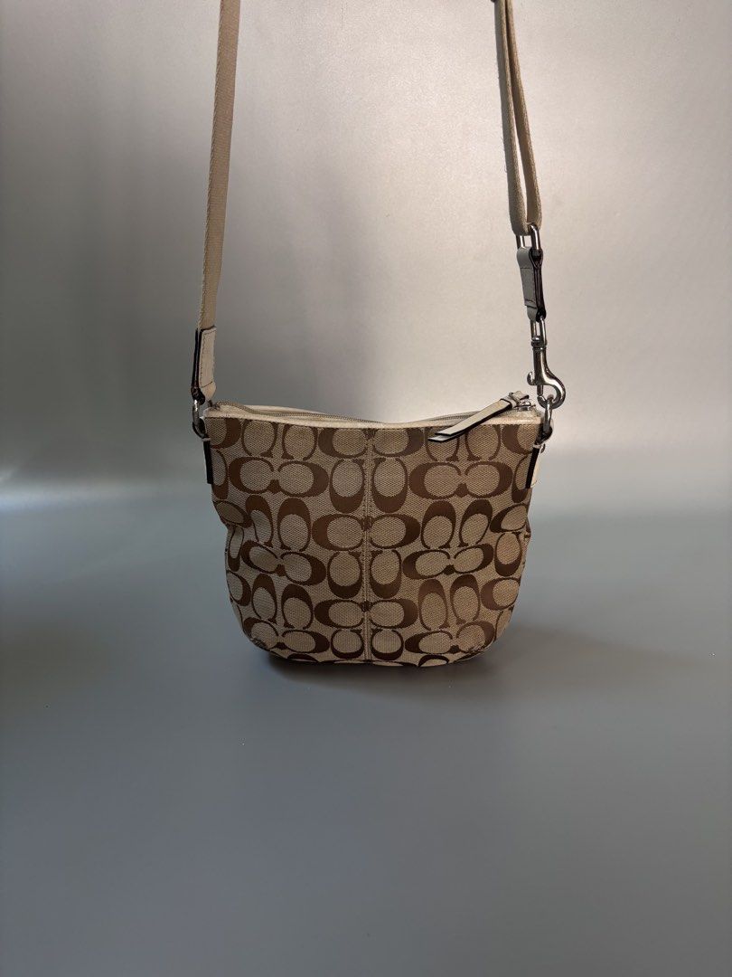 Coach Mini Cross Body Bag (Category: Luxury Bags & Wallets) located in Santa Cruz. Submitted by devbook1 (Listing ID 1436069975, Image 2). Description: Coach Mini Cross Body Bag YKK Zip Unisex Excellent Condition Legit No Issue .