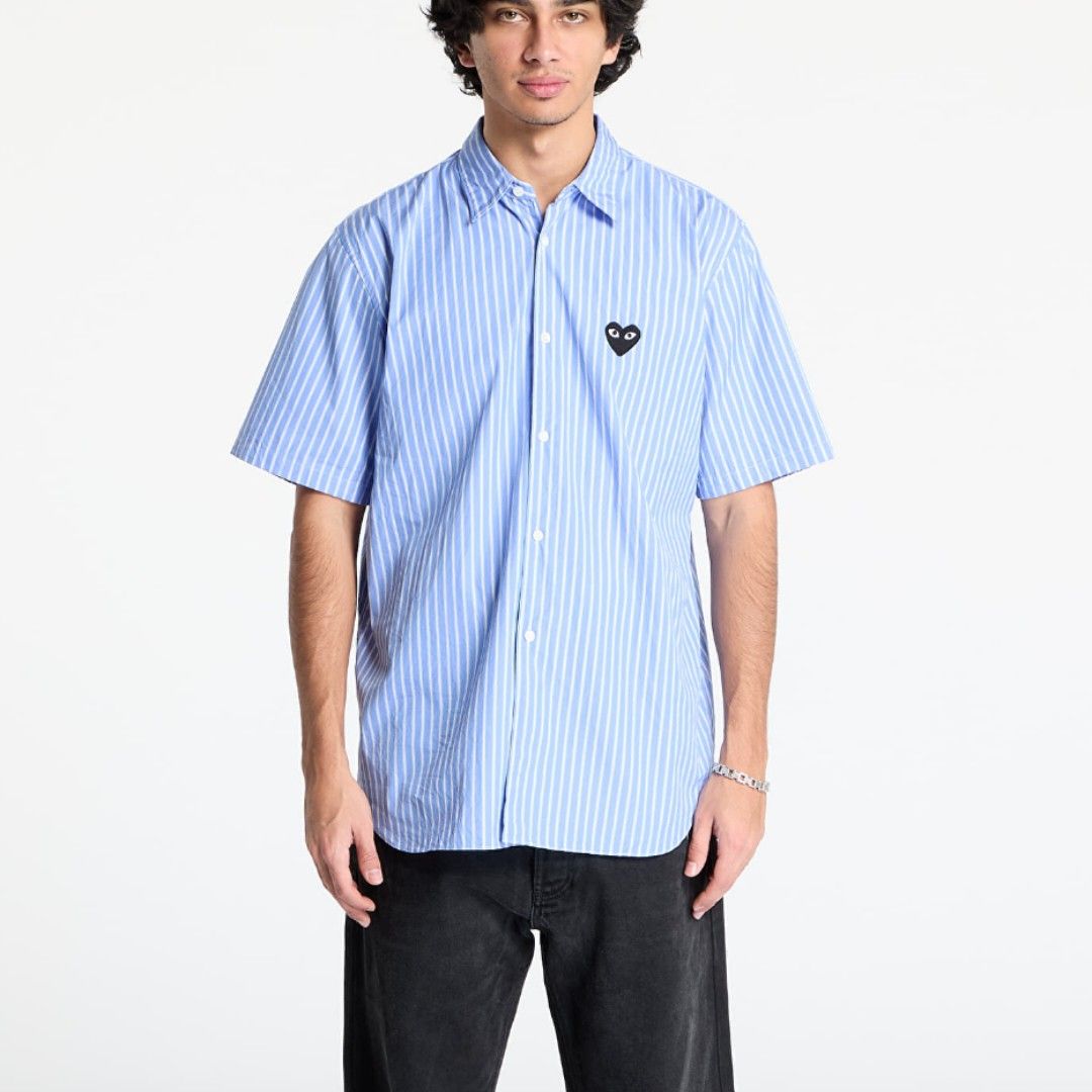 CDG Play POLO Striped Shirt (Category: Tshirts & Polo Shirts ) located in Manila. Submitted by heartyblaire (Listing ID 1436024661, Image 3). Description: -PRE-LOVED SHORT SLEEVE BUTTON DOWN POLO -Comme des Garcons Play shirt - Blue and white stripes - medium size for men - Classic heart logo - Button-down - Relaxed fit - Made in Japan -100% cotton -Price in store P 15,898.