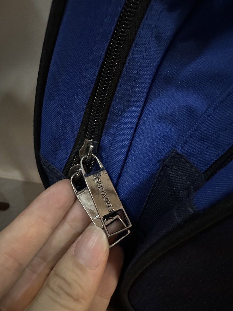 Converse All Star Duffle Bag (Category: Sling Bags) located in Caloocan City. Submitted by kween.of.decluttering (Listing ID 1436077648, Image 3). Description: - Converse All Star duffle bag - Color: Blue and Navy - Shoe pocket / compartment - Main compartment - Side pockets - Detachable shoulder strap - Top handle - Converse logo on front - Branded zippers - Multiple interior compartments.