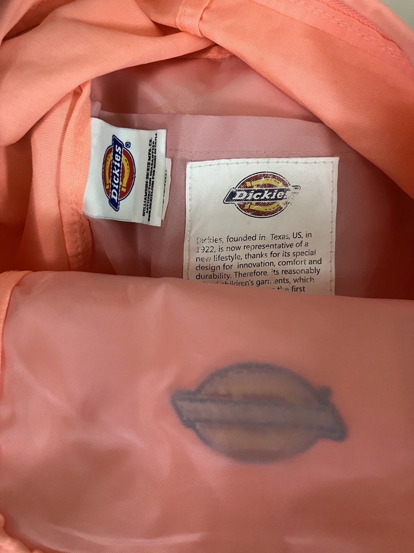 Dickies Backpack - Peach (Category: Backpacks) located in Manila. Submitted by herbolingo55834 (Listing ID 1435968596, Image 1). Description: - Dickies backpack in a lovely peach color. - Features a front pocket. - Adjustable straps for a comfortable fit. - Includes a top handle for easy carrying. - Durable material for everyday use. - Interior with Dickies logo patch. - Stylish and practical design..