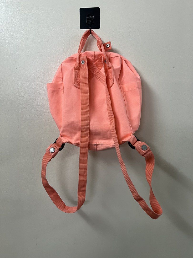 Dickies Backpack - Peach (Category: Backpacks) located in Manila. Submitted by herbolingo55834 (Listing ID 1435968596, Image 2). Description: - Dickies backpack in a lovely peach color. - Features a front pocket. - Adjustable straps for a comfortable fit. - Includes a top handle for easy carrying. - Durable material for everyday use. - Interior with Dickies logo patch. - Stylish and practical design..