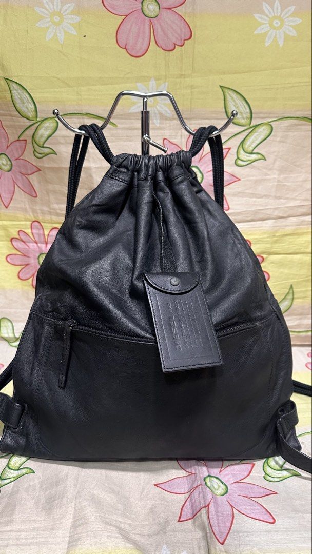 274 DIESEL black leather drawstring backpack bag (Category: Backpacks) located in Baguio. Submitted by princessjhade (Listing ID 1436035176, Image 2). Description: Medium size Very good condition Plus shipping.