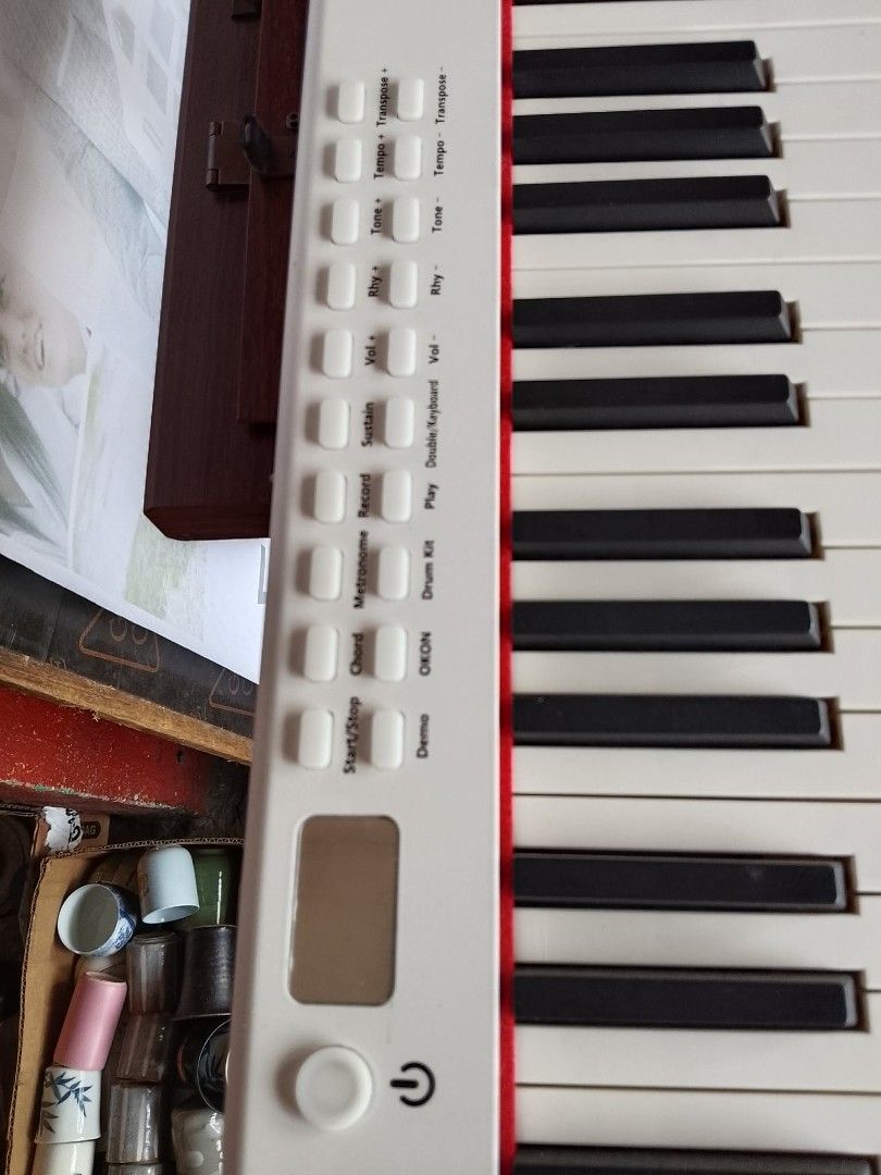 Digital Piano with Multiple Ports (Category: Musical Instruments) located in Quezon City. Submitted by jpnvintageonline (Listing ID 1435932532, Image 3). Description: - Full-size digital piano - Sleek white design with red accents - Features multiple function buttons - Includes L-OUT, R-OUT, MIC, MP3, SUS, LED, and USB ports - In good working condition.