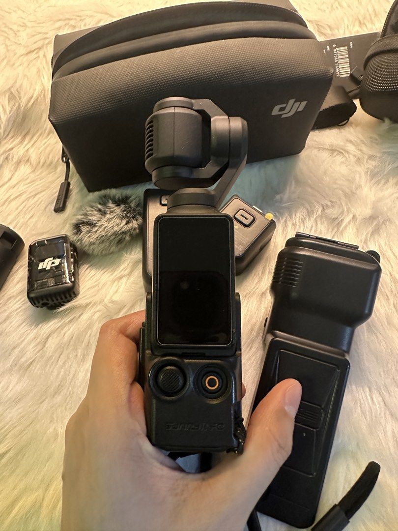 DJI Osmo Pocket 3 Creator Combo with accessories (Slightly Negotiable) (Category: Cameras) located in Valenzuela. Submitted by rrnoazoro (Listing ID 1436048543, Image 3). Description: DJI Osmo Pocket 3 Creator Combo with accessories (Slightly Negotiable) Rarely used, tried it for vlogging (less than 5-8x used outside) Bought from Japan Includes: - Camera bags - 2 Dji pocket casing - Screen protector - Magnetic stand - With box and receipt ❌ No re