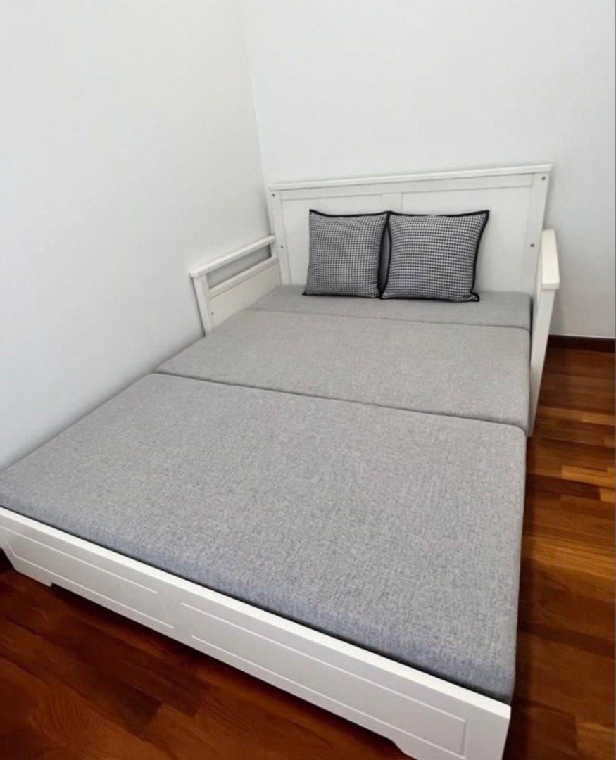 Foldable Sofa Bed (Category: Sofas) located in Singapore. Submitted by bicaiden (Listing ID 1436085264, Image 3). Description: - White sofa bed with grey cushions - Converts easily into a queen size bed - Modern and clean design - Perfect for small spaces or guest rooms - Solid construction.