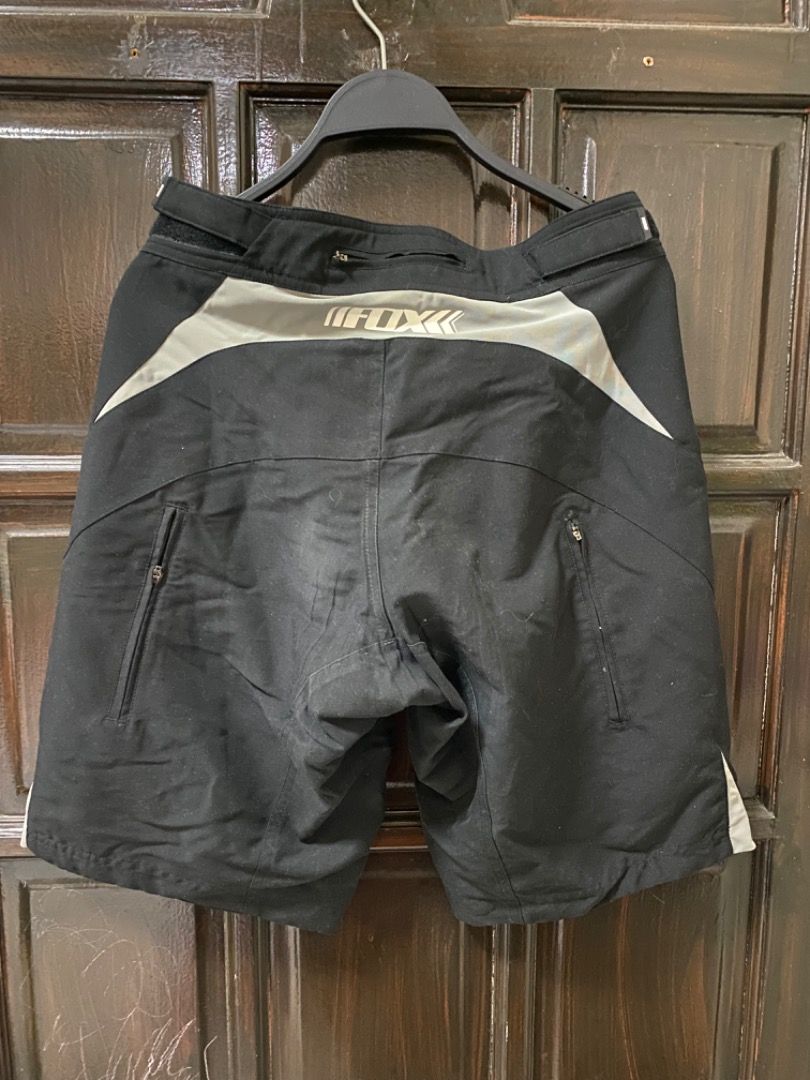 Fox Racing MTB Shorts (Category: Shorts) located in Manila. Submitted by haveago0dthrift (Listing ID 1435981270, Image 2). Description: - Black Fox Racing MTB shorts - Size 30 - Button and zipper closure - Two zippered pockets - Material: 100% polyester, 10% spandex - Includes washing instructions - Features Fox logo - Width 30 - Length 19.