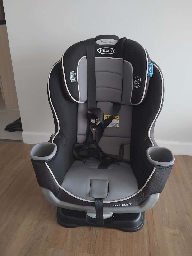 Graco Extend2Fit Convertible Car Seat (Category: Car Seats) located in Pasig City. Submitted by decluttermyclosetph (Listing ID 1436061706, Image 1). Description: - Graco Extend2Fit convertible car seat - 10-position adjustable headrest - Steel-reinforced frame for safety - Easy-to-read level indicator - 6-position extension panel for extra legroom - Provides 5" of extra rear-facing leg room - Includes two cup holders - Suitable for rear-facing a