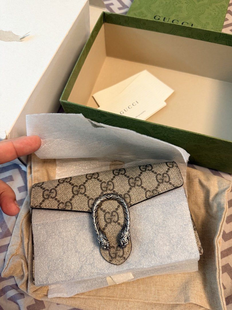 Gucci Dionysus Supermini Bag (Category: Luxury Bags & Wallets) located in Quezon City. Submitted by mjglim (Listing ID 1435919655, Image 2). Description: - Authentic Gucci Dionysus Supermini bag - Iconic tiger head closure - Chain strap - Includes original box, dust bag, and authenticity cards - Excellent, unused condition - Clean interior, no exterior wear - Ideal for everyday or special events RFS: medication Meet up in qc congressional / lalam