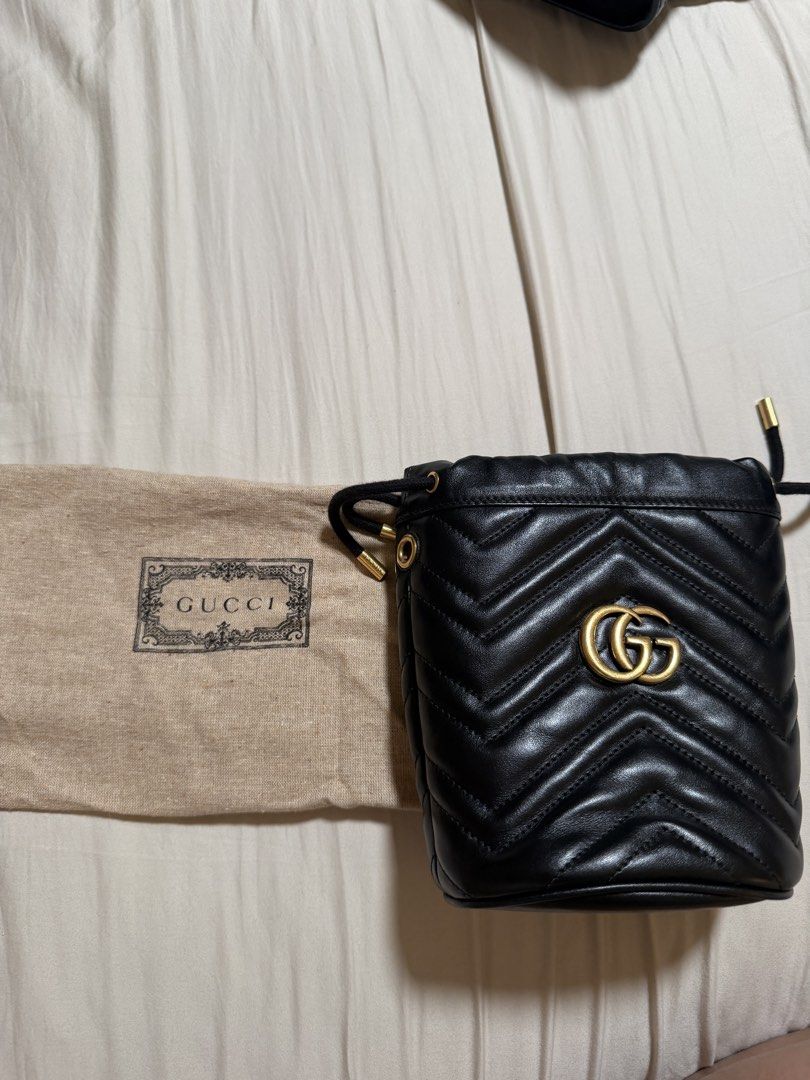 Gucci GG Marmont Mini Bucket Bag (Category: Luxury Bags & Wallets) located in Manila. Submitted by kiiimsantos (Listing ID 1436042082, Image 1). Description: - Authentic Gucci GG Marmont mini bucket bag - Color: Black - Quilted chevron design - Drawstring closure - Gold-toned double G logo - Includes dust bag - Perfect for everyday use - Stylish and compact.