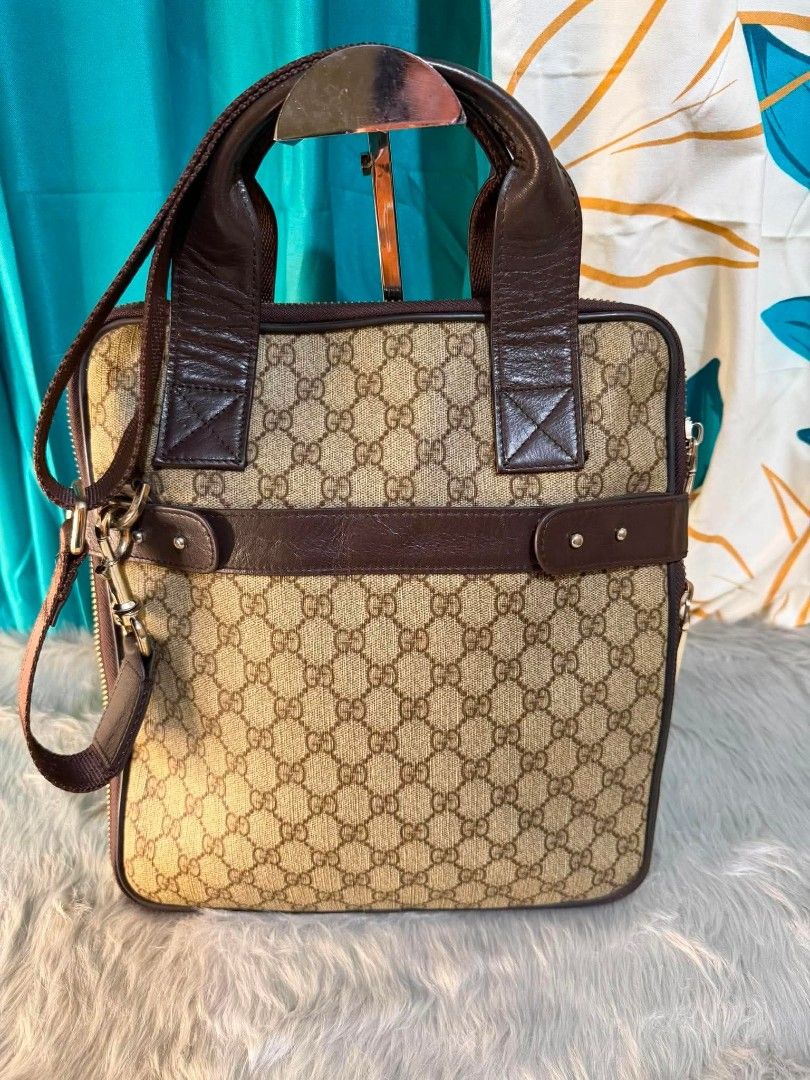 Gucci GG Supreme Messenger Bag (Category: Luxury Bags & Wallets) located in Manila. Submitted by solisraque20674 (Listing ID 1435993246, Image 2). Description: - Authentic Gucci messenger bag - Iconic GG Supreme canvas - Brown leather trim - Detachable shoulder strap - Top handle - Zip closure - Gold-tone hardware - Gucci logo on front.