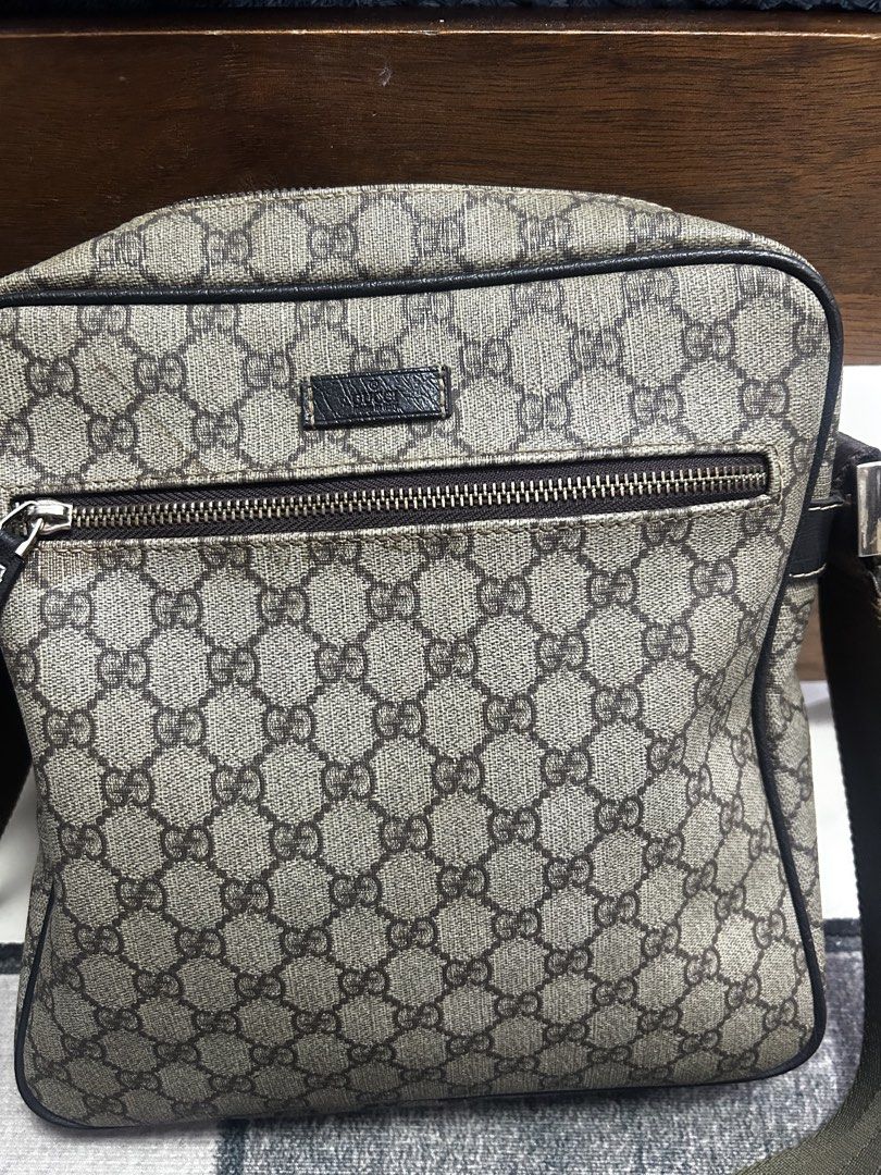 Gucci GG Supreme Shoulder Bag (Category: Luxury Bags & Wallets) located in Lucena. Submitted by blush_lux (Listing ID 1436058197, Image 1). Description: - Gucci messenger shoulder bag -With serial code 201448 8583 - Iconic GG Supreme canvas - Secure zip closure - Gucci under zip - Adjustable shoulder strap - Includes small leather Gucci logo tag - Lined interior - Classic and versatile design.