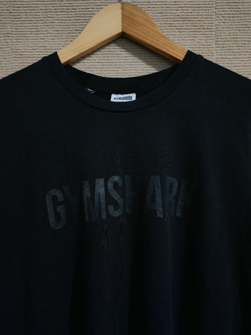 Gym shark longsleeve black spell out (Category: Swim Top & Rash Guards) located in Iligan City. Submitted by wantwears14 (Listing ID 1435932489, Image 2). Description: Good as new with size tag No issue on print Bagong bago and super black in person.