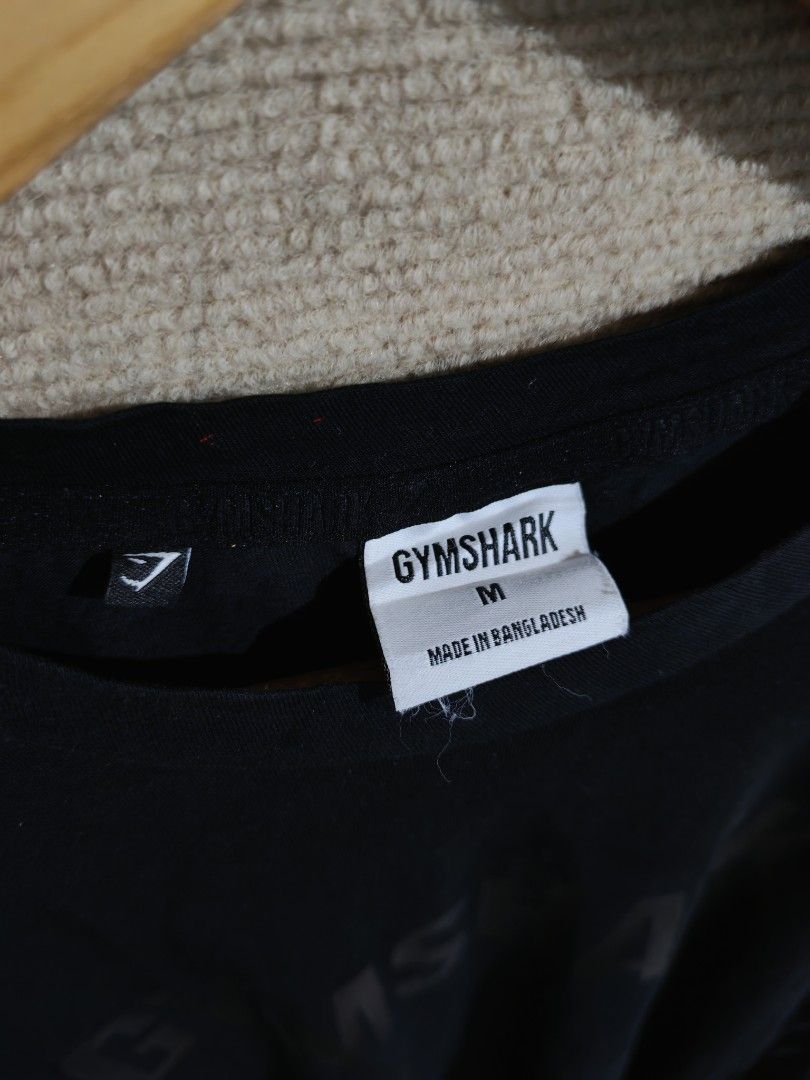 Gym shark longsleeve black spell out (Category: Swim Top & Rash Guards) located in Iligan City. Submitted by wantwears14 (Listing ID 1435932489, Image 3). Description: Good as new with size tag No issue on print Bagong bago and super black in person.