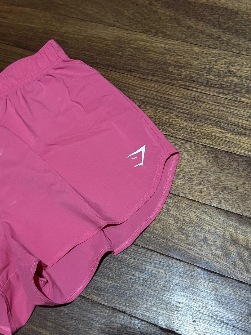 GYMSHARK PINK LOOSE SHORTS (Category: Shorts) located in Pasig City. Submitted by t.fusion (Listing ID 1436087712, Image 2). Description: GYMSHARK PINK LOOSE SHORTS excellent condition size: W 28-34 | L 11 🔖 ₱1,000 +sf.