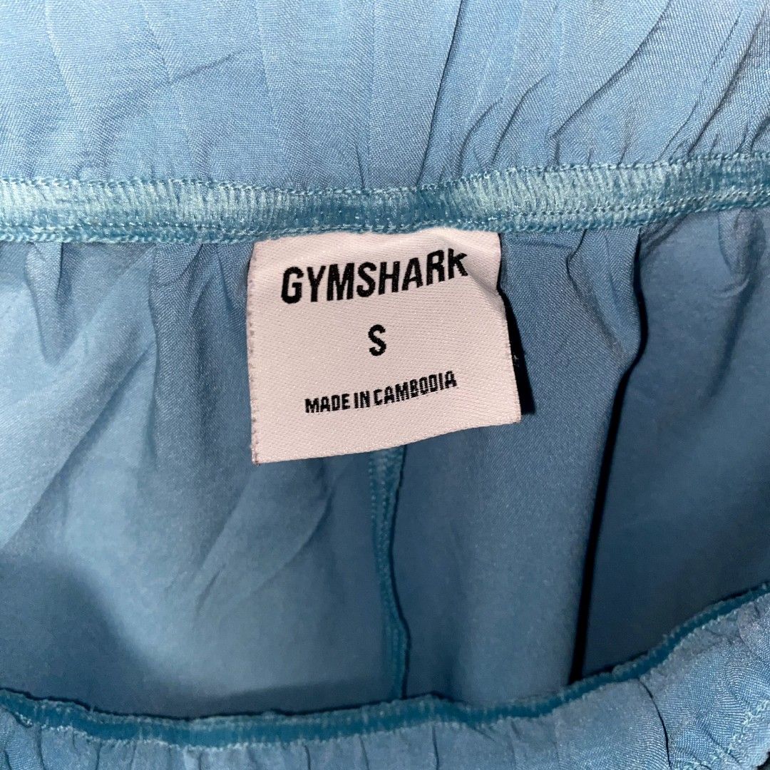 Gymshark Running Shorts - Blue - Size S (Category: Activewear) located in Manila. Submitted by safehawk-c9a684 (Listing ID 1435950345, Image 2). Description: - Gymshark running shorts - Vibrant blue color - Size: S - Features Gymshark logo - Made in Cambodia - Elastic waistband - Perfect for workouts or casual wear.