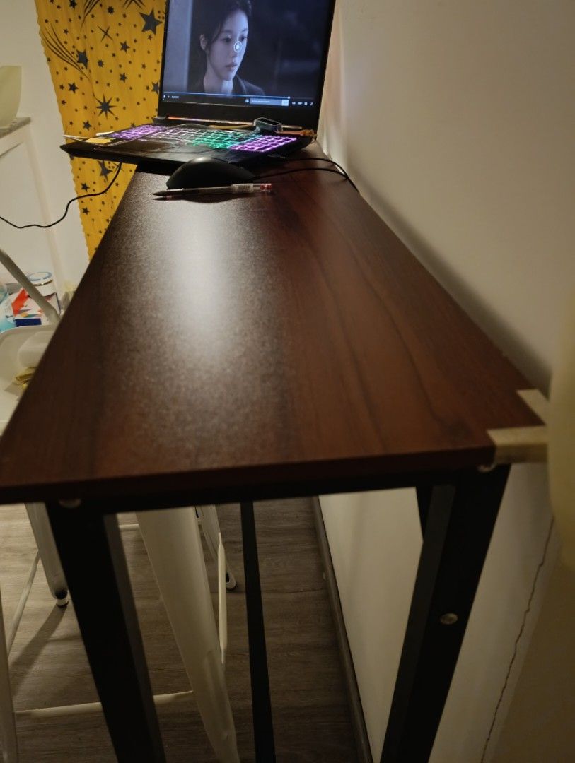 High Table Narrow Bar Table (Category: Tables & Sets) located in Caloocan City. Submitted by negotiableman (Listing ID 1436090894, Image 3). Description: Bought this from Orange app recently See photos for the issue, there were slight scratches, therefore I covered it with masking tape so it won't get worse. Overall, it's still durable. RFS: I need a lower table. Let me know if you also like the chair, the chair is worth ₱1,200 from the orange ap