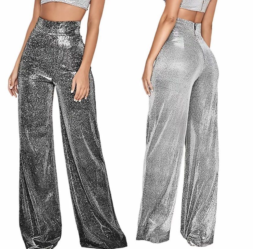 High waist wide leg pants (Category: Jeans) located in Bacoor. Submitted by jp.13 (Listing ID 1435995918, Image 2). Description: FOR SALE❗️ Flare elastic rear zipper trouser Silver Glittery Used once on a event Slight Nego Payment first via gcash or bank transfer MOD: LBC or lalamove (buyer’s expense) Location: Cavite DM for more info .
