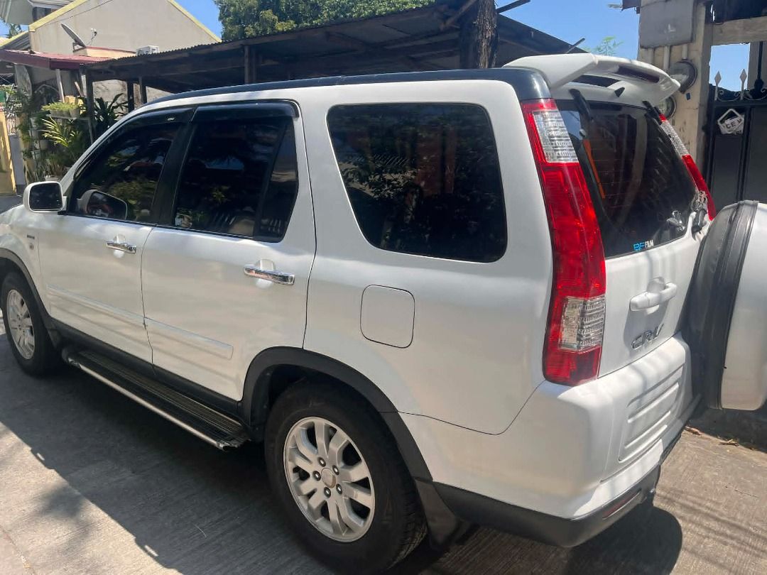 Honda CR-V 2.0 i-VTEC (A) (Category: Used Cars) located in Taytay. Submitted by jane_blared (Listing ID 1435971793, Image 2). Description: CRV Gen 2 model Auto 100% no engine problem All working Clean inside and out Fresh paint Ready for long drive Complete papers 2 keys Registered until Feb 2027 Deep dash matting Leather seats Picnic table Quiet engine Slex RFID ready Contact me here. 0917.164.1768.