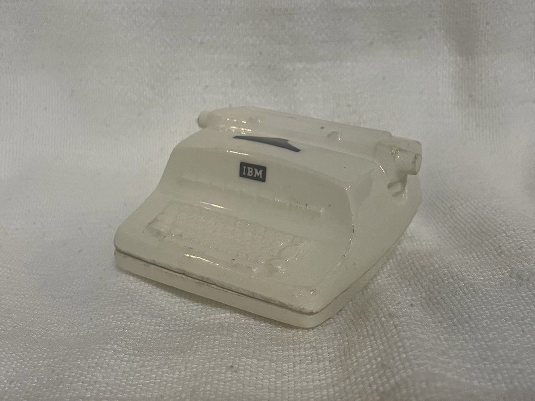 IBM Typewriter Trinket Container (Category: Vintage Collectibles) located in Quezon City. Submitted by bluebutterflycoffetc (Listing ID 1436021819, Image 1). Description: - Miniature ceramic IBM typewriter trinket holder/container - Originally used to hold paper clips and staples - Vintage collectible - A detailed replica of a classic typewriter.