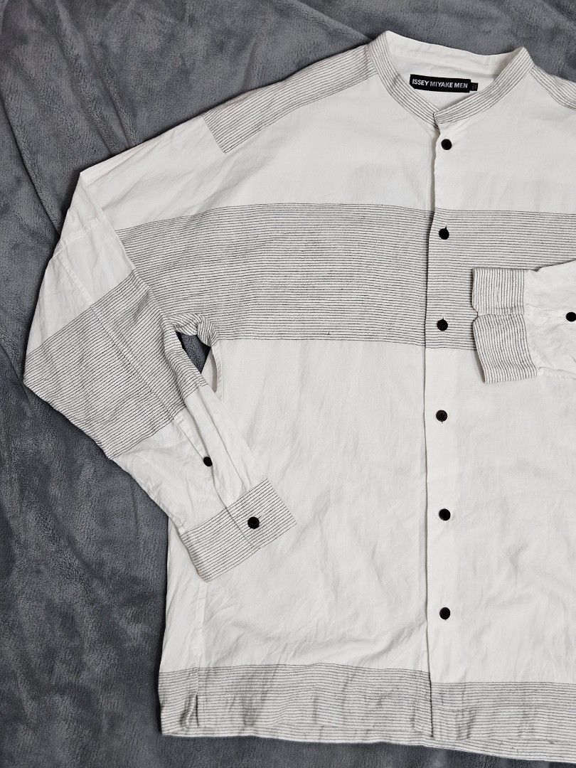 Issey Miyake Men Button Down Shirt (Category: Tshirts & Polo Shirts ) located in Candon. Submitted by itssummer08 (Listing ID 1436000380, Image 3). Description: Excellent Condition Issey Miyake Button Down polo. One missing button on left Cuff. Made in Japan, not faded. Very presentable. Kept only in the Cabinet 29 x 22.