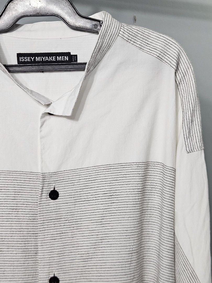 Issey Miyake Men Button Down Shirt (Category: Tshirts & Polo Shirts ) located in Candon. Submitted by itssummer08 (Listing ID 1436000380, Image 2). Description: Excellent Condition Issey Miyake Button Down polo. One missing button on left Cuff. Made in Japan, not faded. Very presentable. Kept only in the Cabinet 29 x 22.