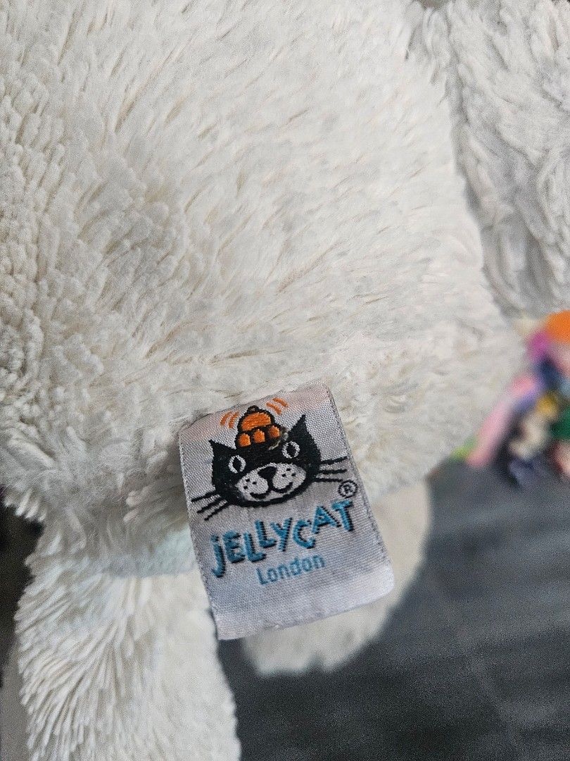 Jellycat White Bunny Plush Toy (Category: Plushies & Soft Toys) located in Lingayen. Submitted by vargasjer57073 (Listing ID 1435912477, Image 3). Description: - Adorable Jellycat bunny plush toy - Features soft, white fur - Long, floppy ears - Pink nose - Includes Jellycat tag - Perfect for cuddling or decoration.