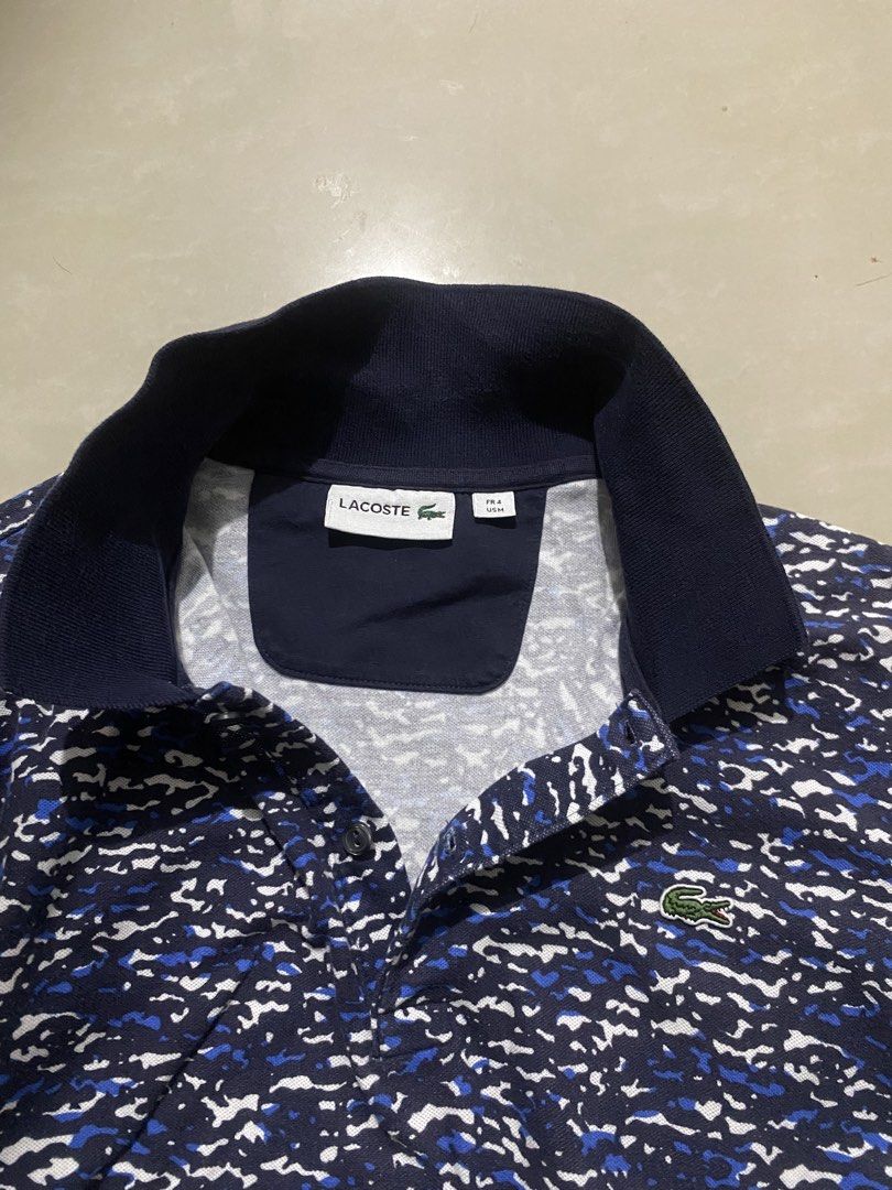 Lacoste men polo shirt (Category: Tshirts & Polo Shirts ) located in Marikina City. Submitted by andreioruga (Listing ID 1436089483, Image 3). Description: Lacoste width - 20 length - 25 color rate: 9.5/10 issue: minor sign of usage condition: good 📩.