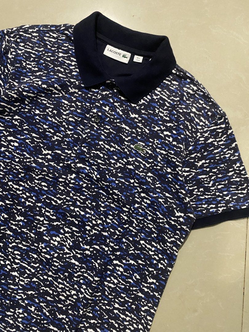 Lacoste men polo shirt (Category: Tshirts & Polo Shirts ) located in Marikina City. Submitted by andreioruga (Listing ID 1436089483, Image 2). Description: Lacoste width - 20 length - 25 color rate: 9.5/10 issue: minor sign of usage condition: good 📩.