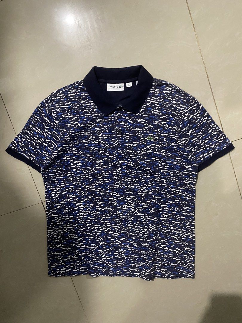 Lacoste men polo shirt (Category: Tshirts & Polo Shirts ) located in Marikina City. Submitted by andreioruga (Listing ID 1436089483, Image 1). Description: Lacoste width - 20 length - 25 color rate: 9.5/10 issue: minor sign of usage condition: good 📩.