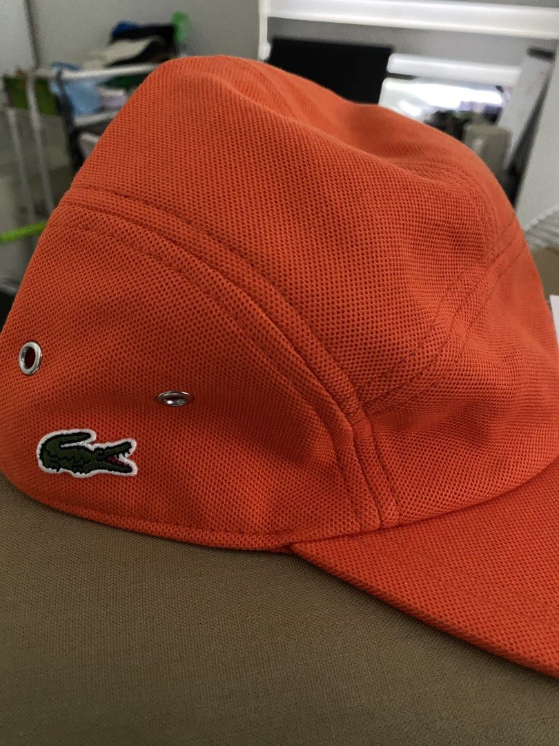 Lacoste Orange Cap (Category: Caps & Hats) located in Makati City. Submitted by rye16 (Listing ID 1435948883, Image 3). Description: - Brand new Lacoste cap - Eye-catching orange color - Size: M - Features the iconic Lacoste logo - Made from comfortable cotton material - Unisex design, suitable for everyone - Comes with original tag attached - Never been worn.