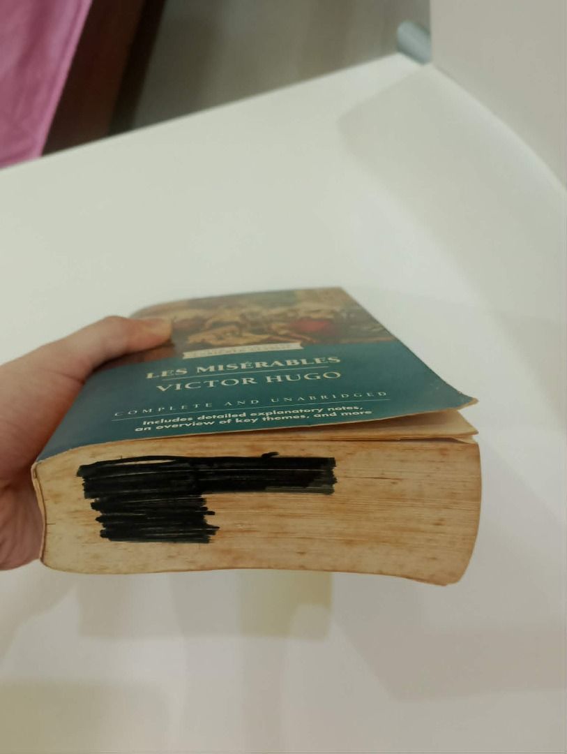 Les Miserables by Victor Hugo (Category: Storybooks) located in Caloocan City. Submitted by happyowl_0f28b8 (Listing ID 1435926438, Image 3). Description: - Bought in 2014-2017 - Has some tanning and foxing but still very readable - Reason for selling: decluttering, used this back in high school and no longer need - I labelled the top and bottom of the book back then with my name, which is why there are now big black pentel pen marks.