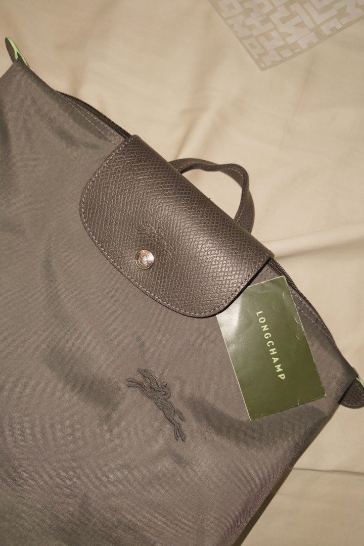 Longchamp Le Pliage Backpack (Category: Luxury Bags & Wallets) located in Muntinlupa City. Submitted by goldlevel (Listing ID 1436074948, Image 1). Description: Graphite color Large backpack.