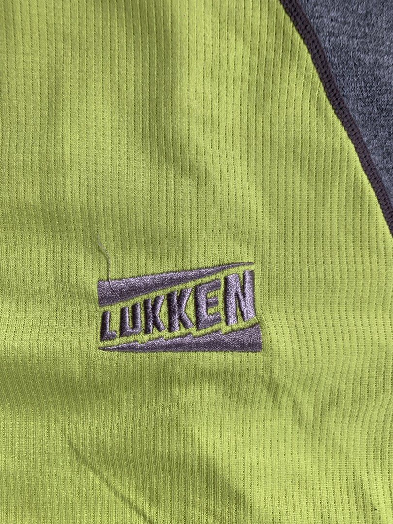 Lukken Athletic Shirt (Category: Tshirts & Polo Shirts ) located in Baguio. Submitted by brix6699 (Listing ID 1435972920, Image 2). Description: - Neon green athletic shirt - Gray and olive green accents - "Lukken" logo on front and back - Breathable, possibly moisture-wicking material - Crew neck - Short sleeves - Ideal for sports and casual activities Dimensions Length 26.5 inches Width 19 inches .